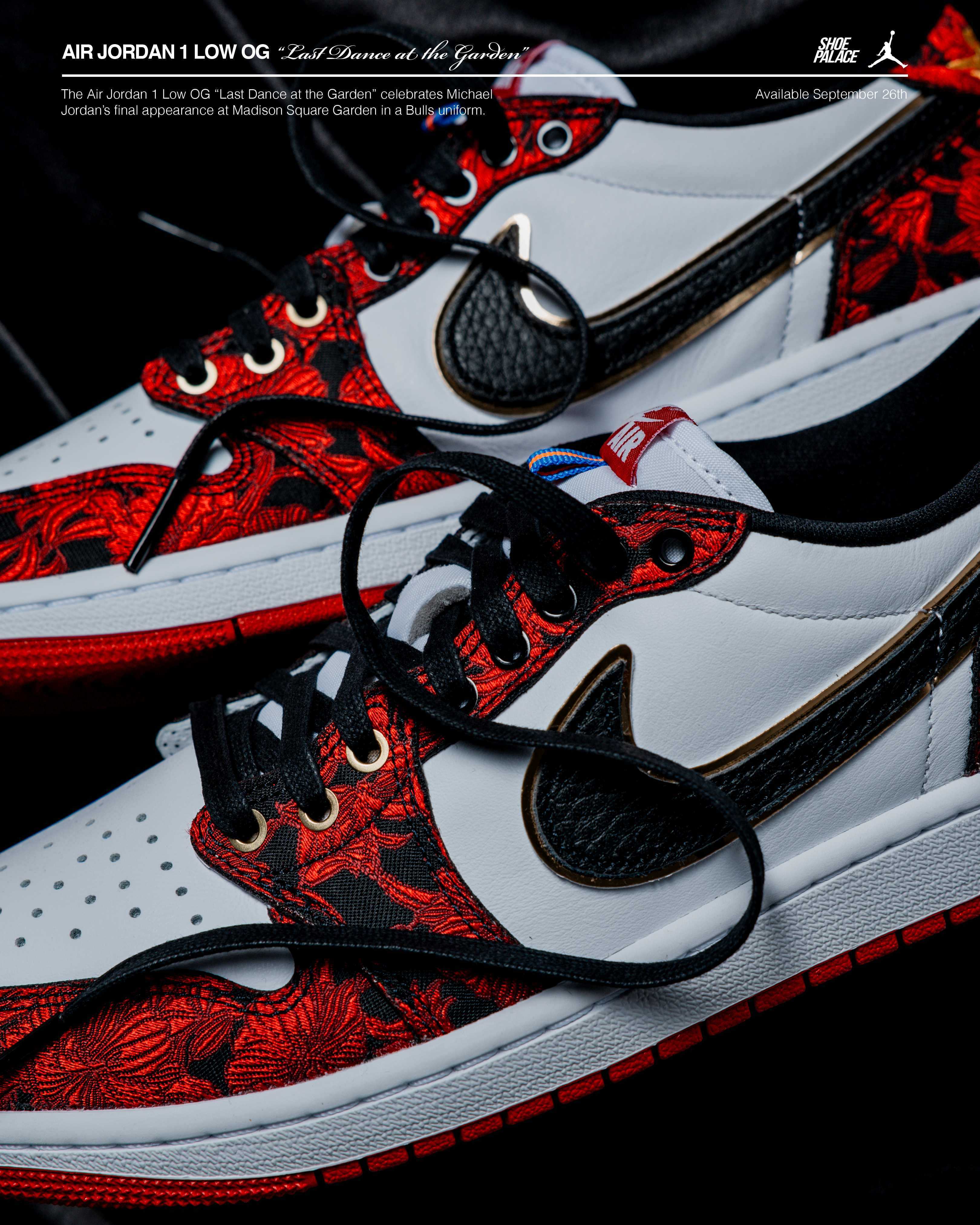 Close-up of stylish red and white sneakers with intricate designs.