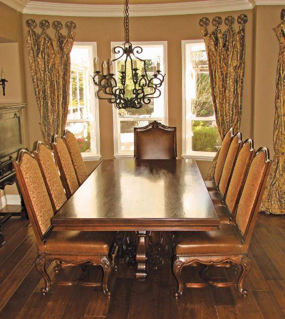 hand carved Via Romani custom Spanish revival dining table