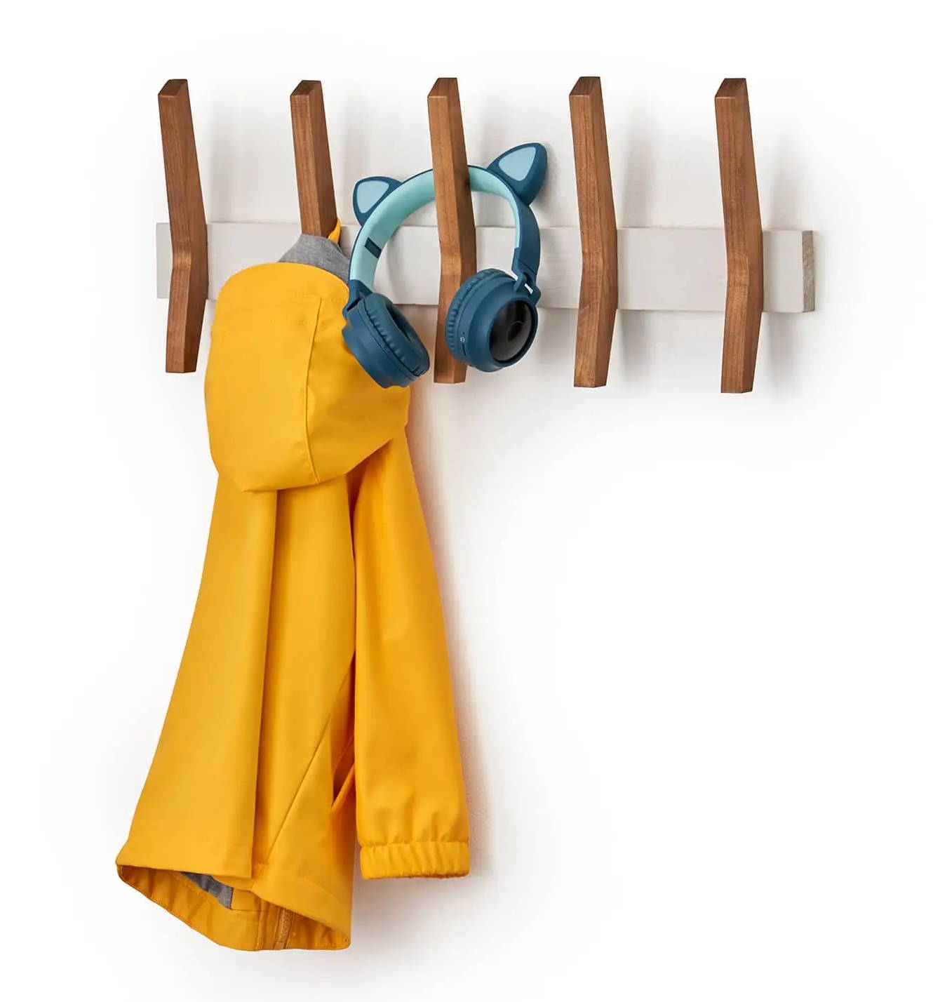 wood wall rack with 5 hooks, with a coat and headphones hanging