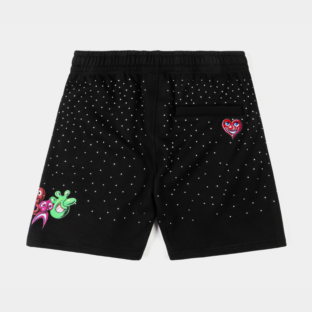 Black shorts with colorful designs and pockets.