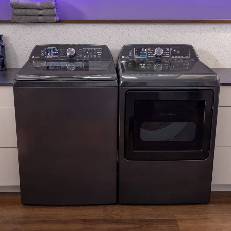 GE Profile Top Load Washer and Dryer pair in laundry room