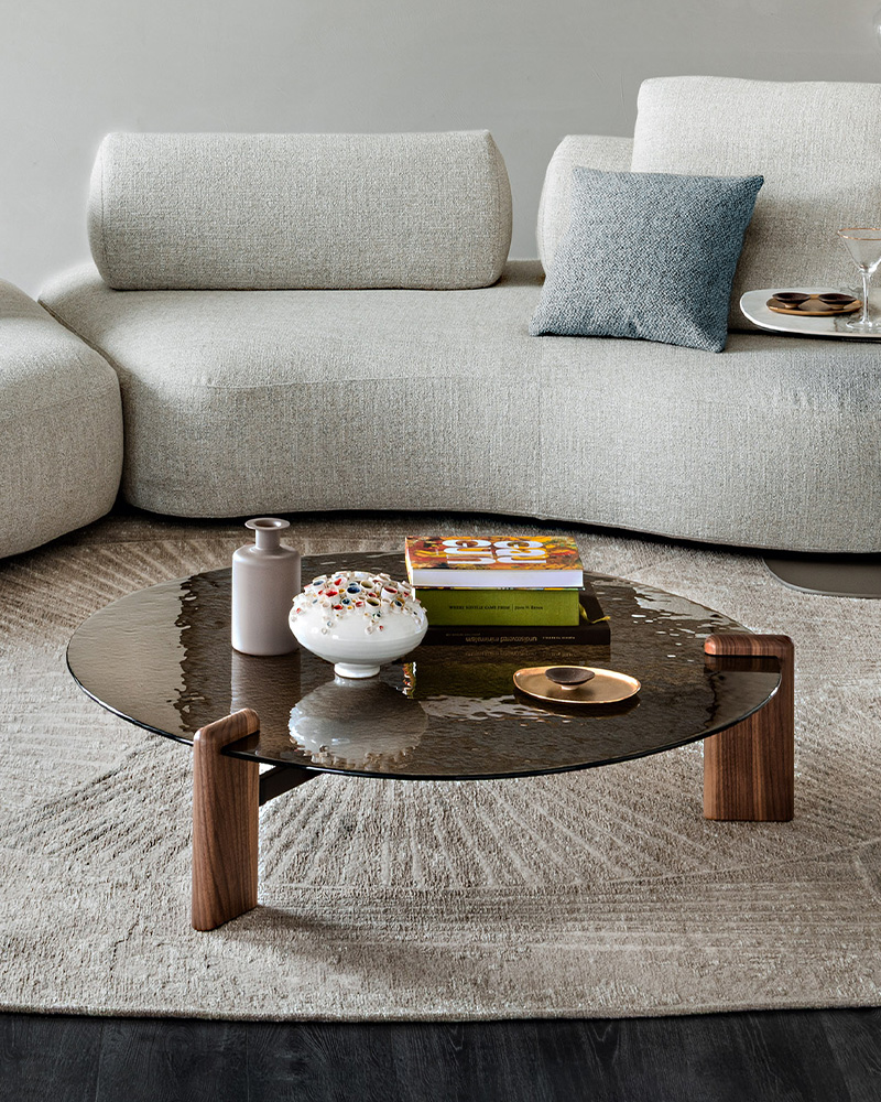 Round Cattelan Italia coffee table with a minimalist design and two supporting legs.