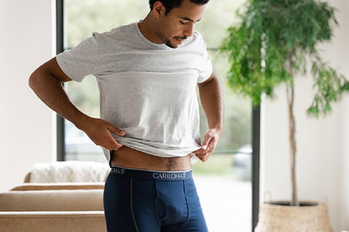 man wearing navy bamboo boxer briefs