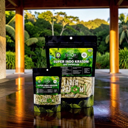 Bags of Super Indo Kratom on a wooden table outdoors.