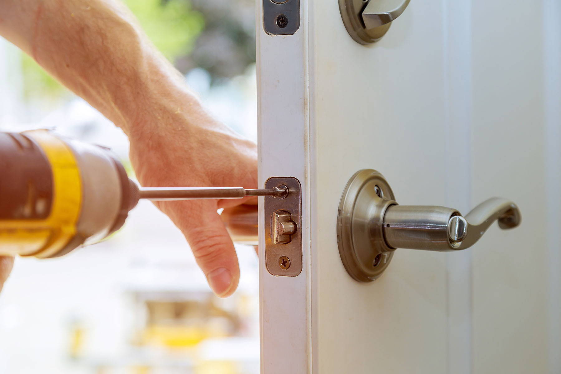 Changing locks on front door of home