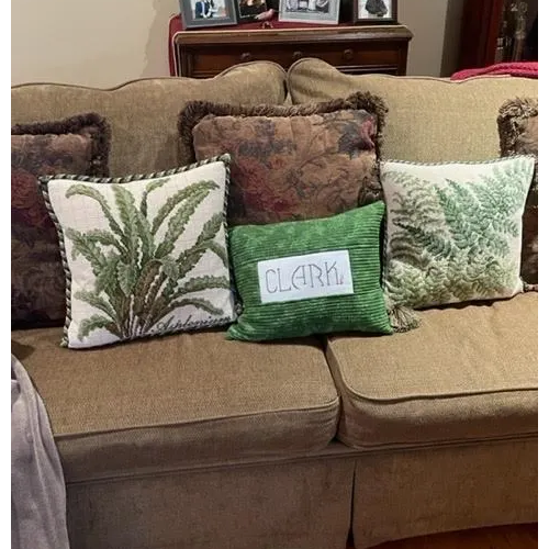Needlepoint cushions on couch