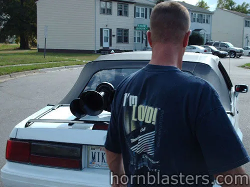 Close-up of Shocker XL horn bells and brackets on Ford Mustang HornBlasters gallery photo 9