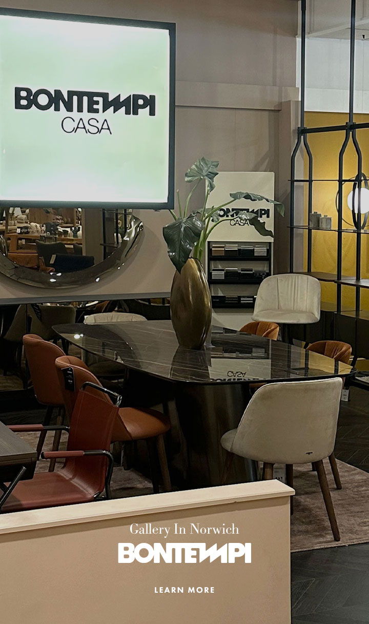Photo of the Bontempi Casa furniture gallery in Norwich. Marble top tables and luxury dining chairs on display.