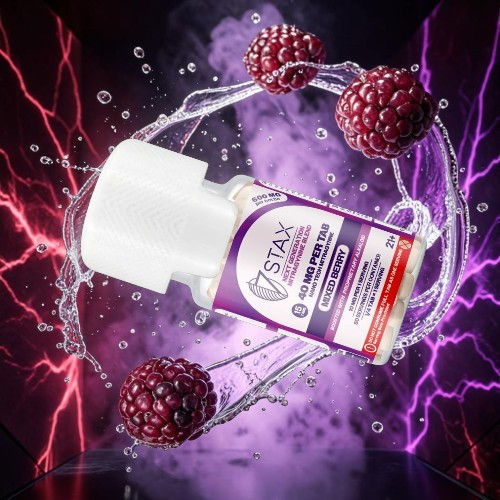Bottle of STAX product with blackberries and purple lightning effects.