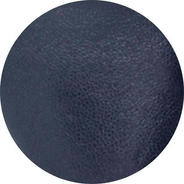 Dark textured circular surface with a leather-like appearance.