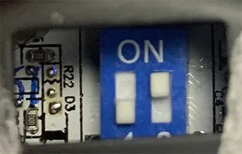 Digital gauge seated in mounting hole