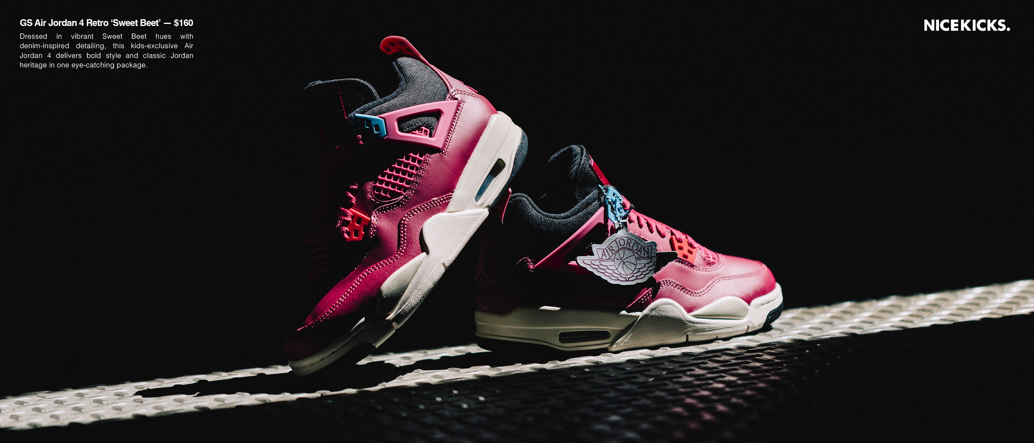 A pair of stylish pink and black athletic shoes on a dark background.