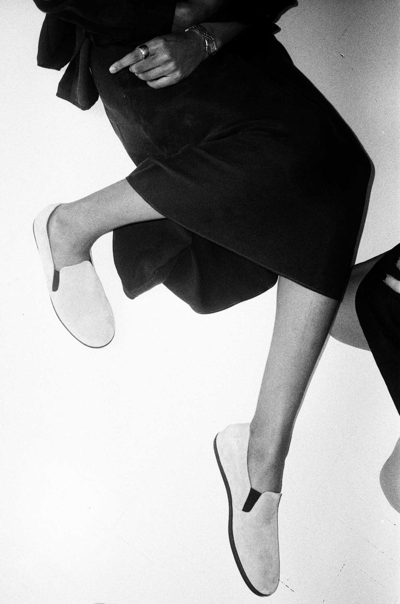 bottom half of woman, sitting on floor 
