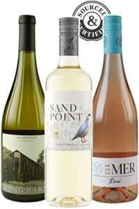 Three bottles of wine with different labels.