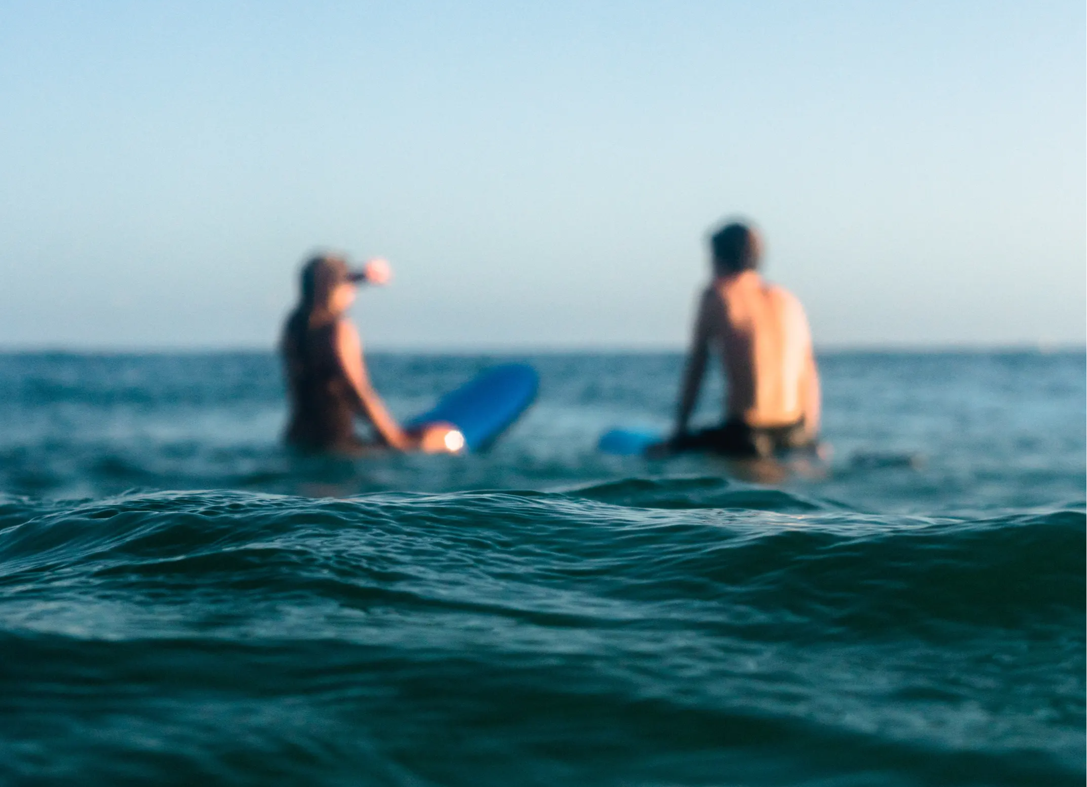 adventurous date with two people surfing together
