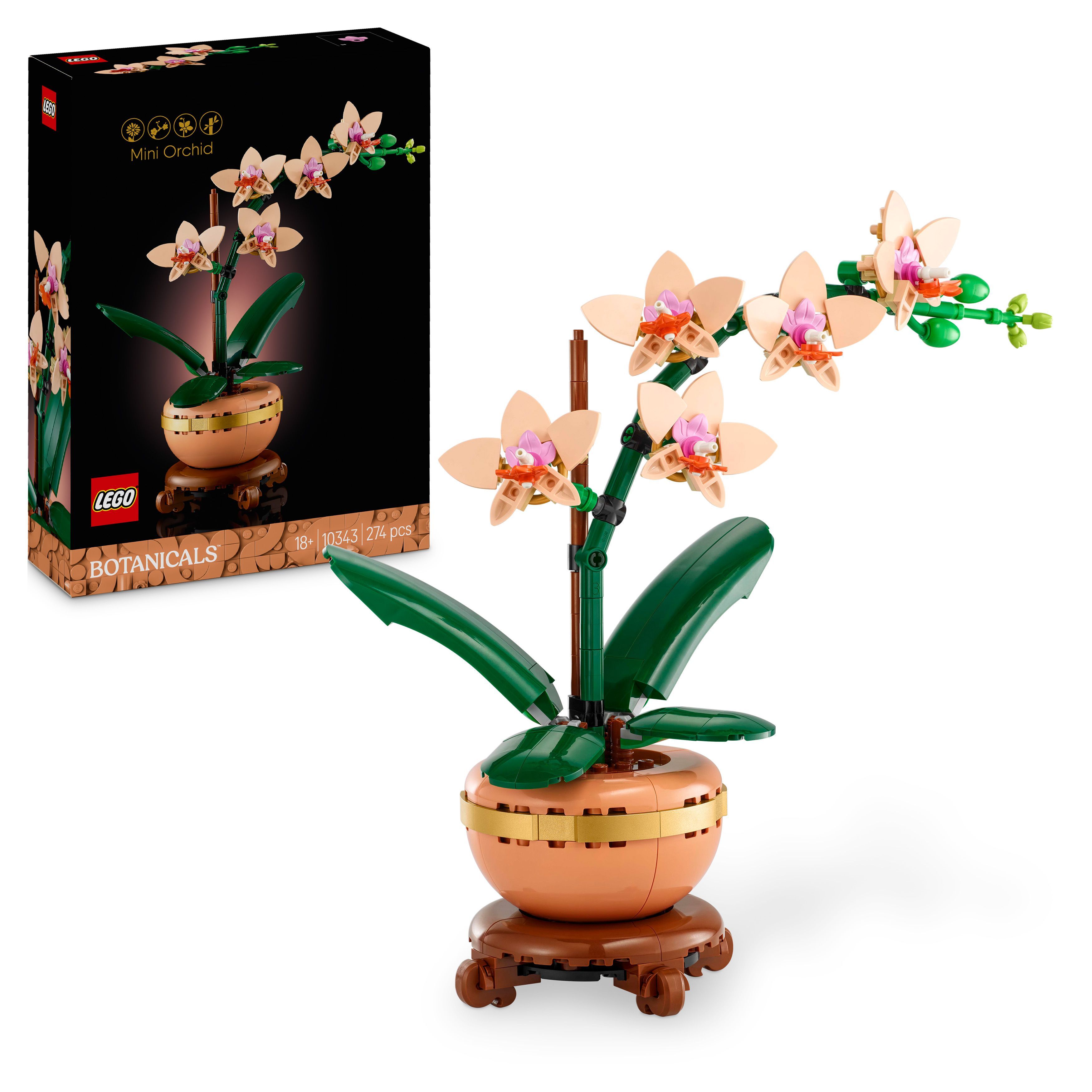 LEGO orchid plant model next to its packaging box.
