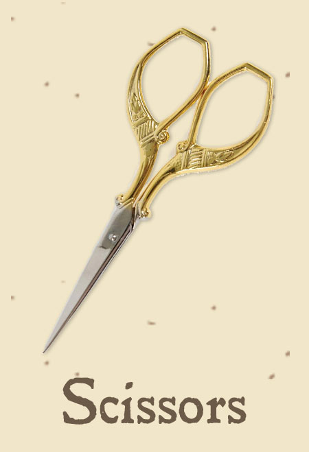A pair of decorative scissors on a light background with the word 