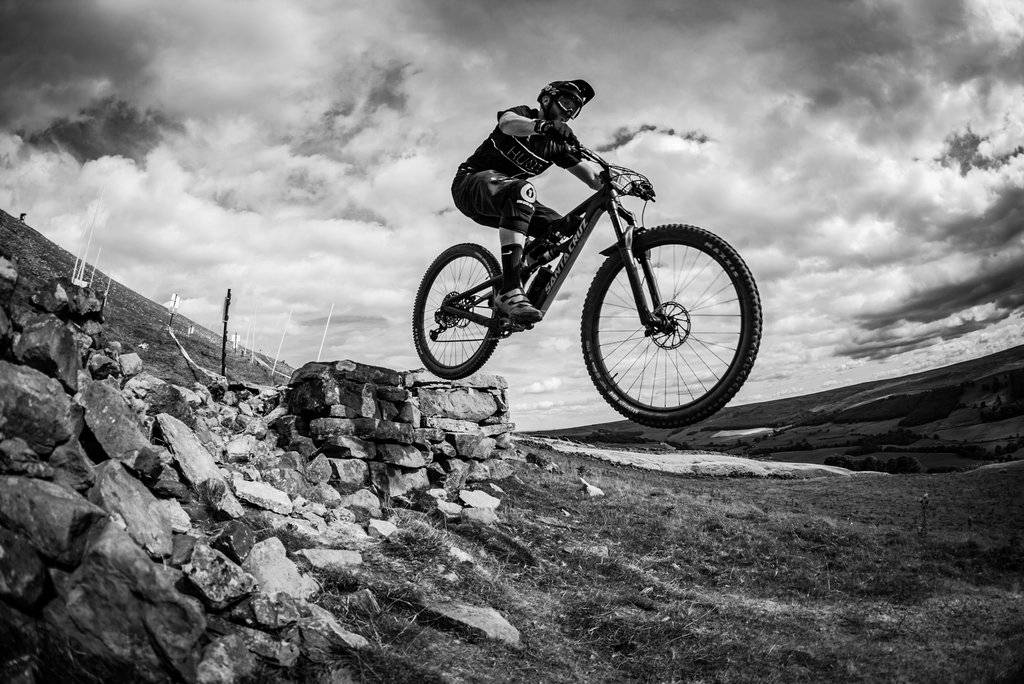 Hunt Co-Founder Tom Marchment jumping a mountain bike