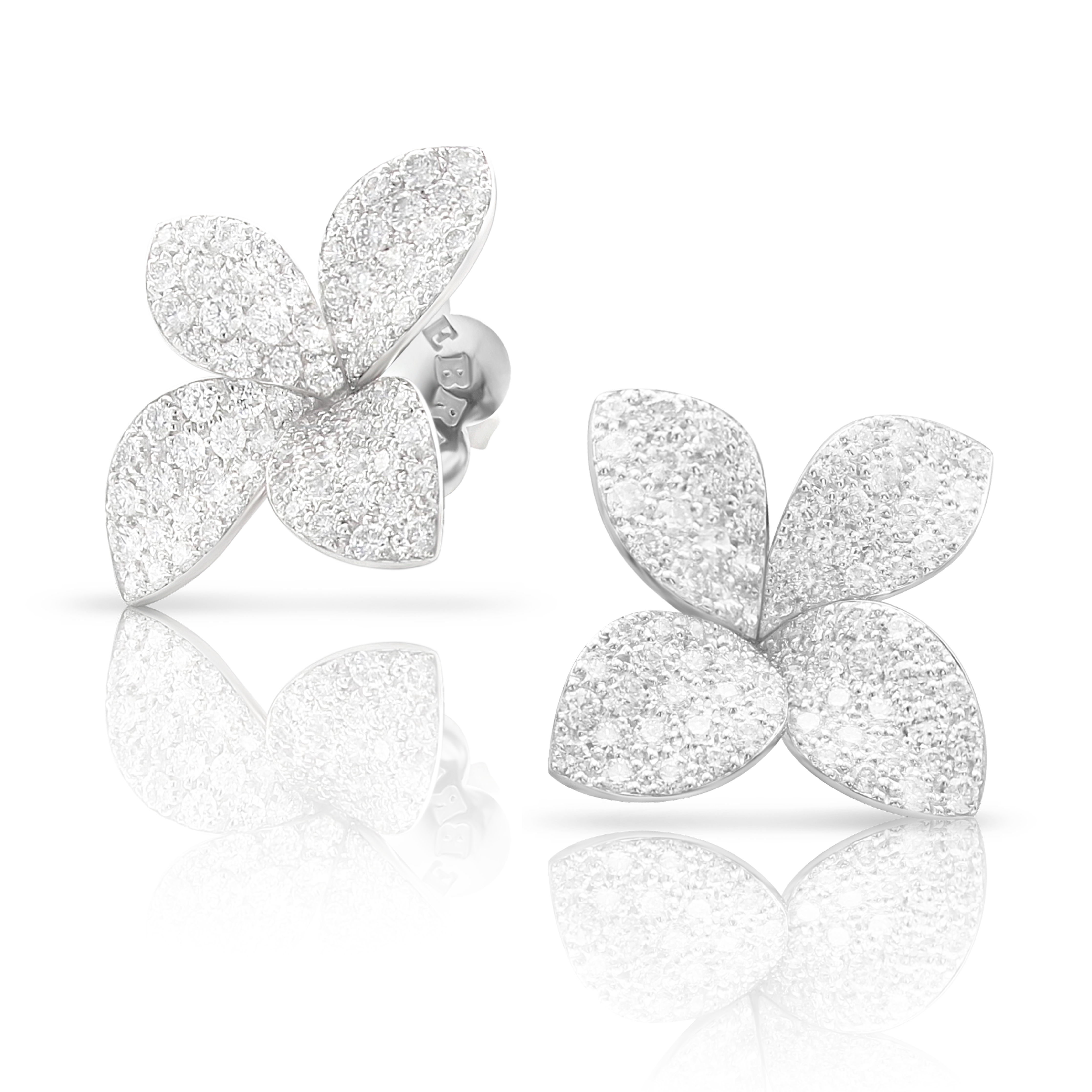 Jewelry design featuring elegant flower-shaped diamond earrings.