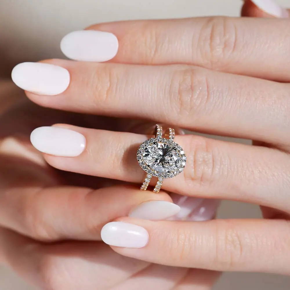 Woman wearing the Coco Split Shank Engagement Ring by MiaDonna
