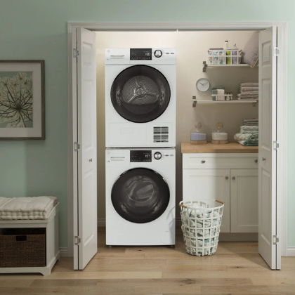 Laundry room with stacked washer and dryer, storage shelves, and a laundry basket.