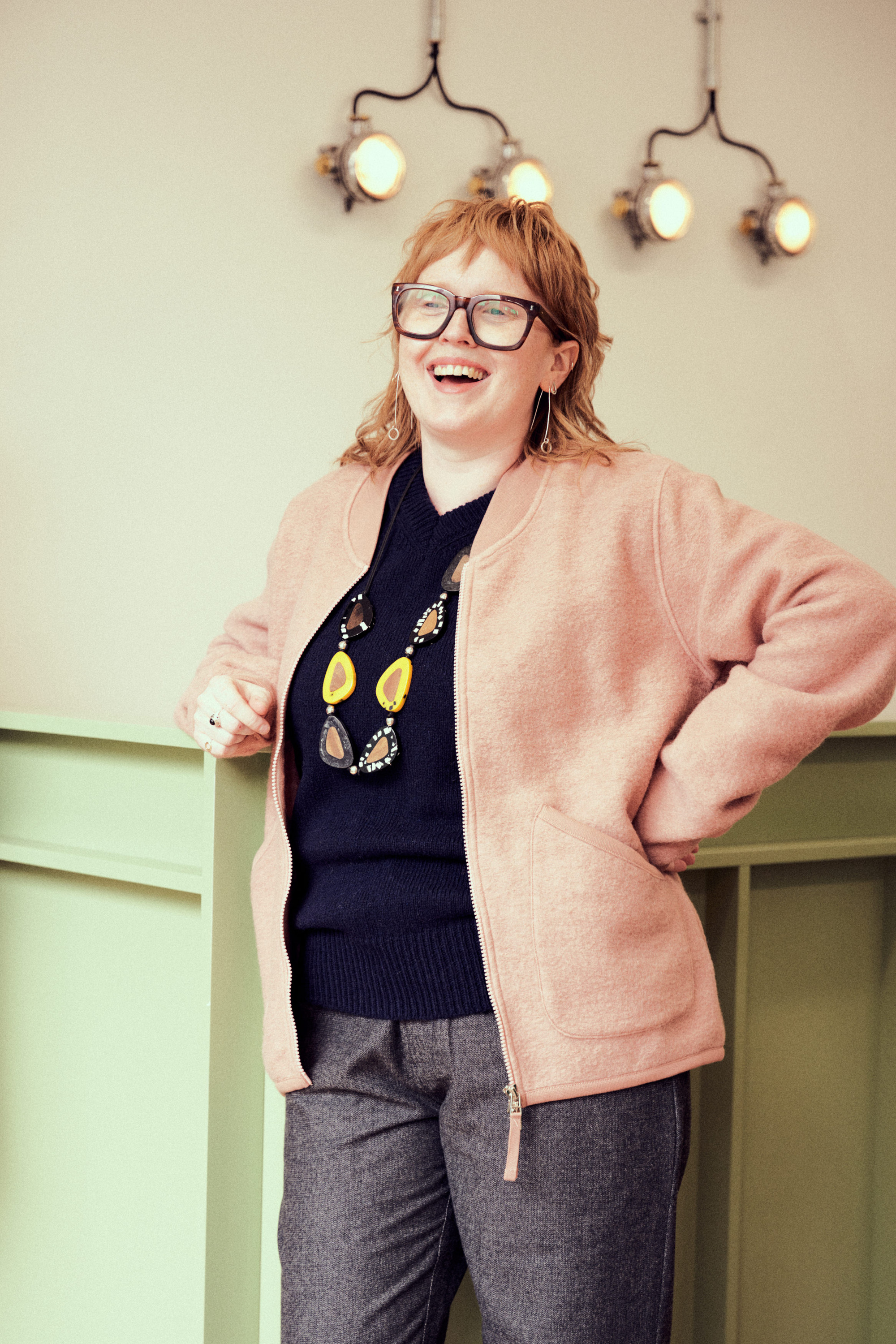 Frankie from our Derby Road Store laughing and looking great in our Zip Bomber Jacket in Wool Fleece.