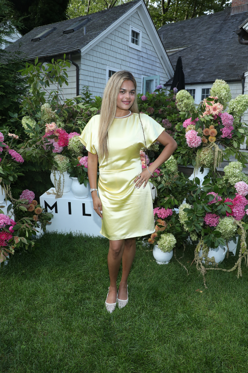 Wearing the Kora Dress at MILLY x The Daily Front Row's Maidstone Hamptons Cocktail Party.