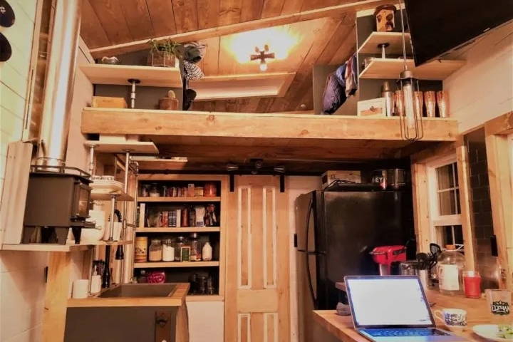 Inside of a tiny house built using reclaimed wood