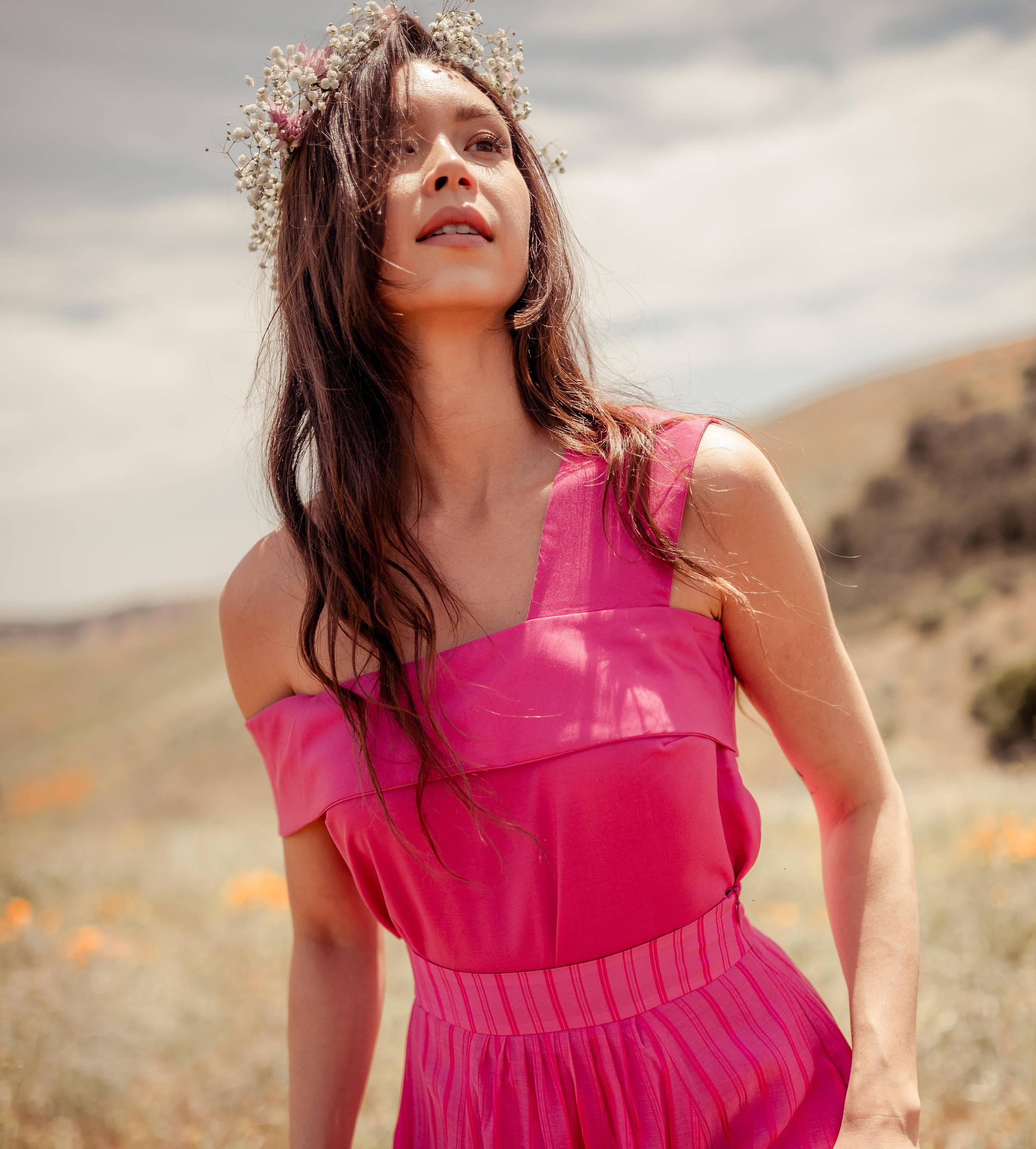 woman wearing white tencel top with off shoulder strap