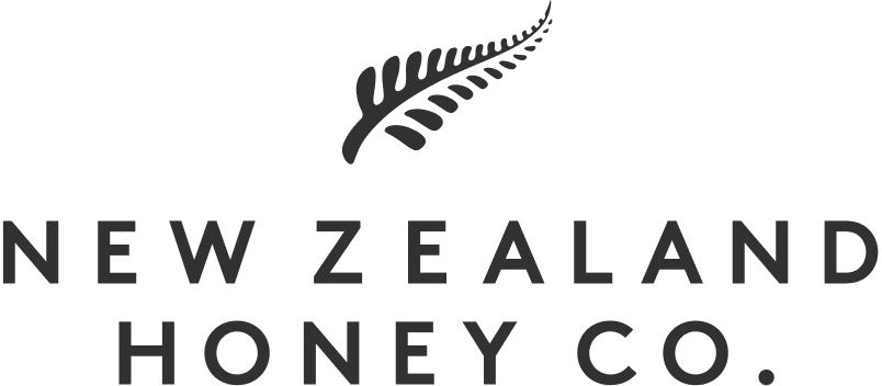 Logo of New Zealand Honey Co. with stylized fern.