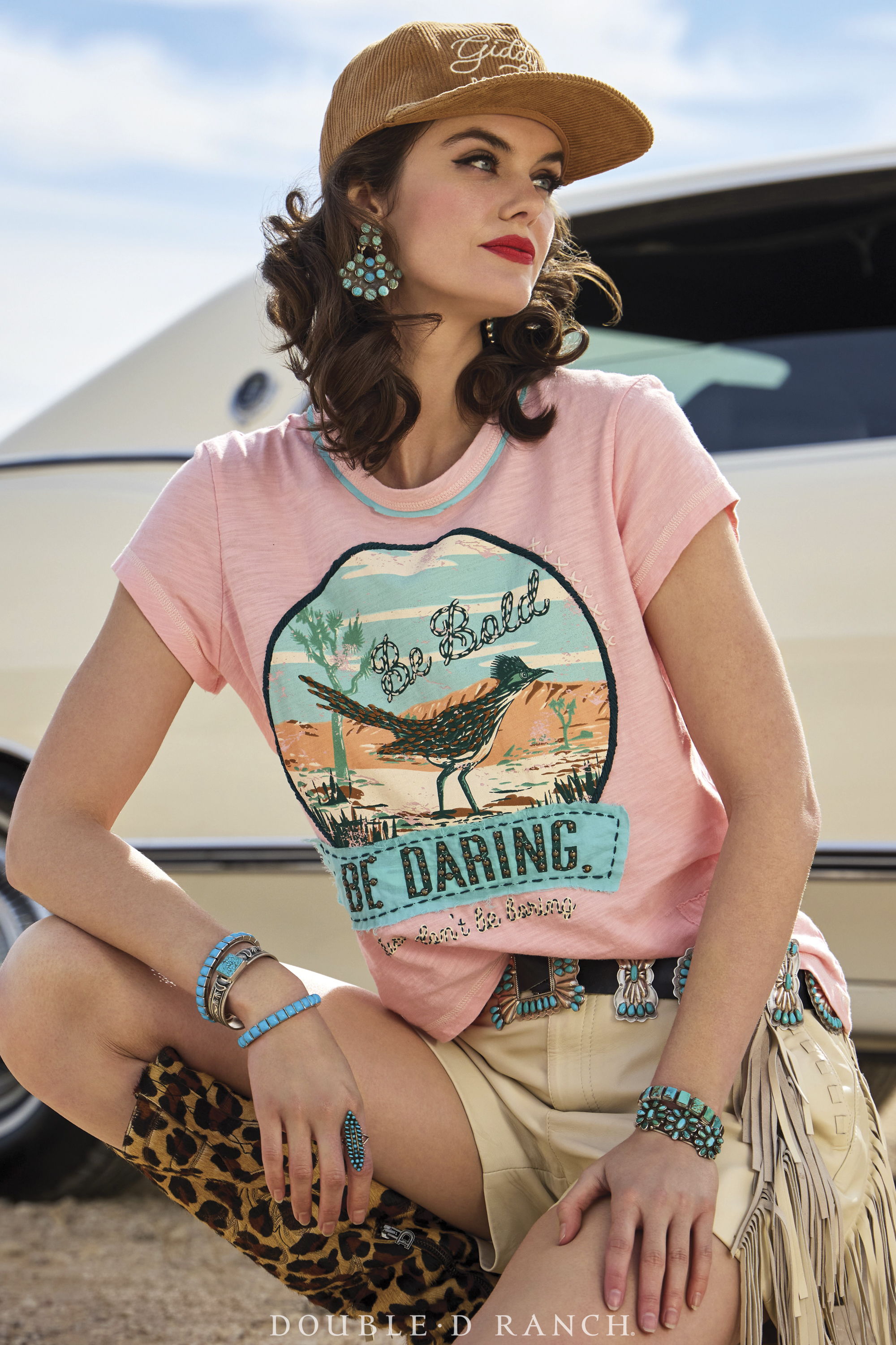 Kaylin wearing the Be Bold, Be Daring Top from the Rhinestone Suits and Cowboy Boots Collection.