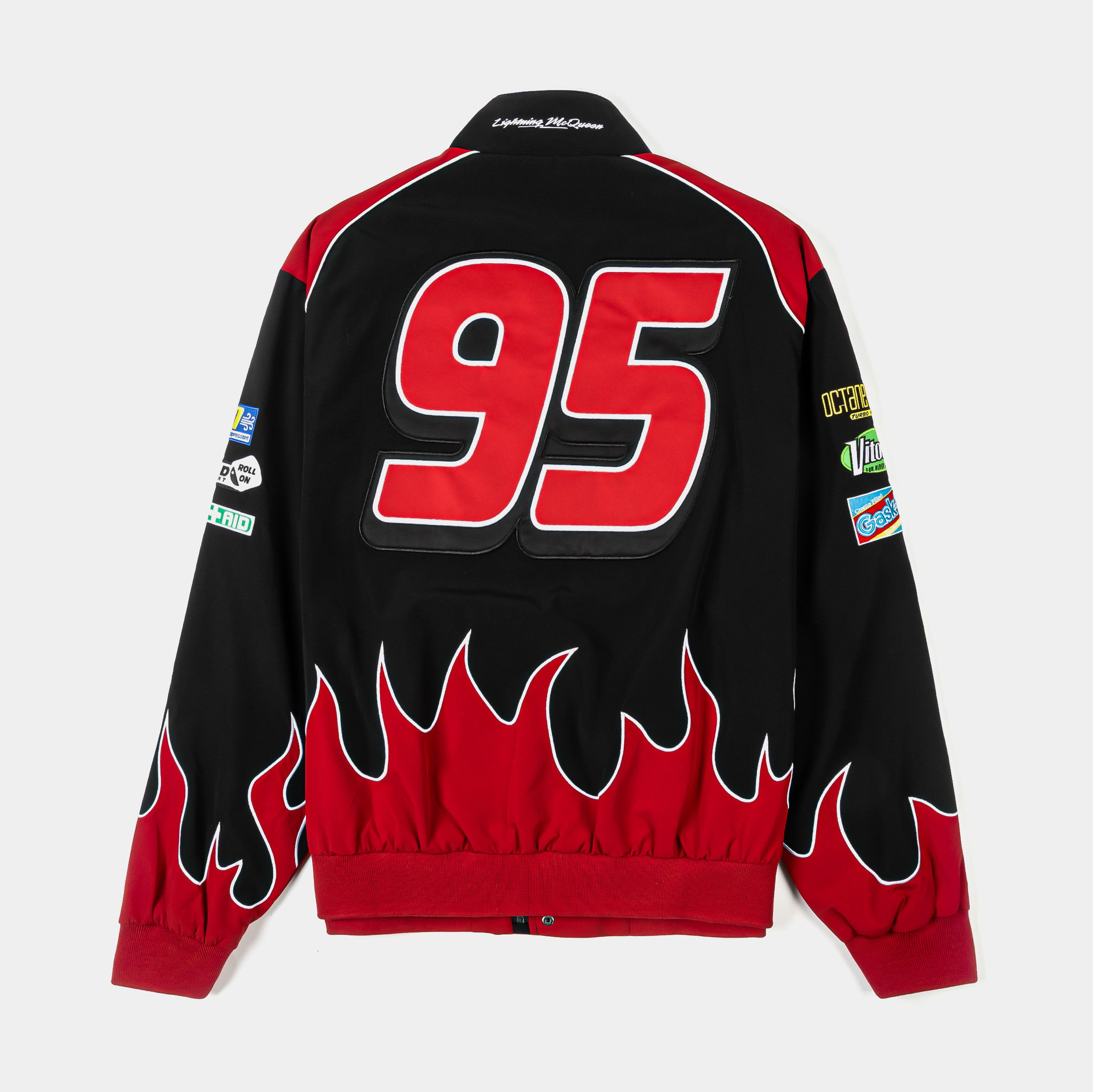 Black and red jacket with flame design and Rust-eze logo.