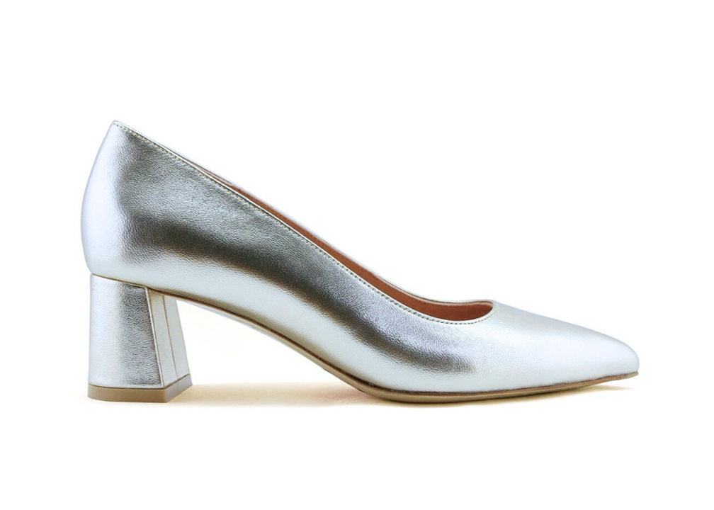 A silver high-heeled shoe with a block heel.