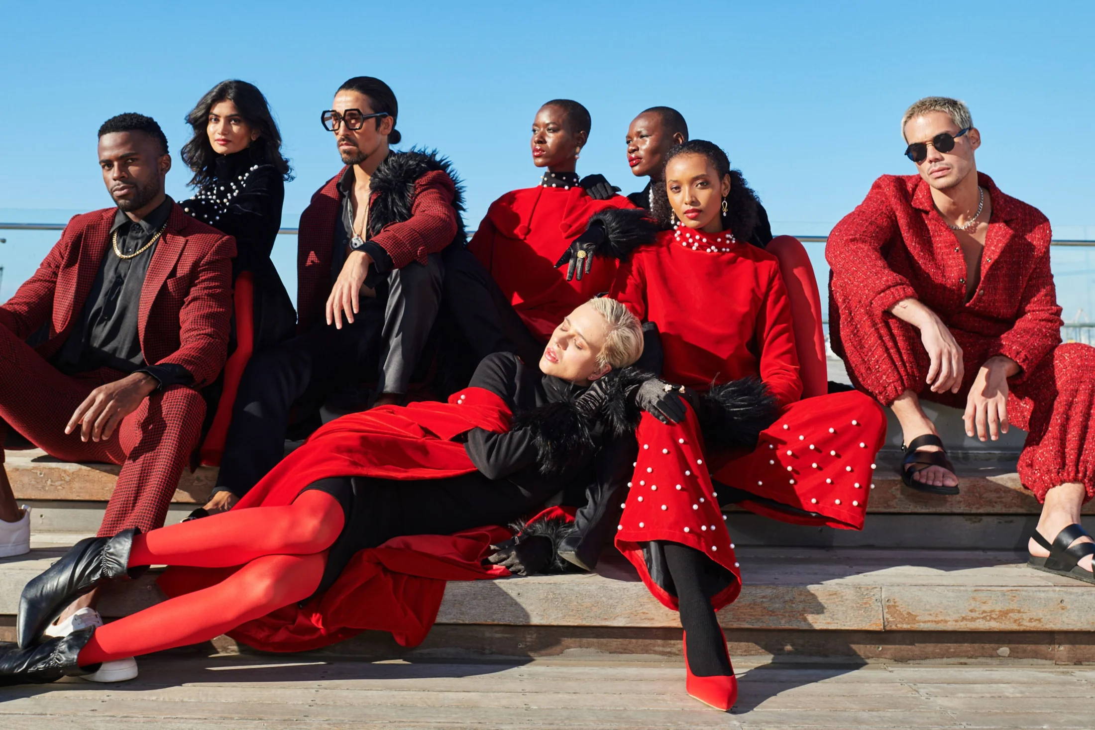 Group of models in red and black clothing by AFI Privé in Cape Town