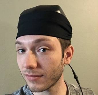 selfie of man wearing perfect fit headband and illumiflow 272 pro