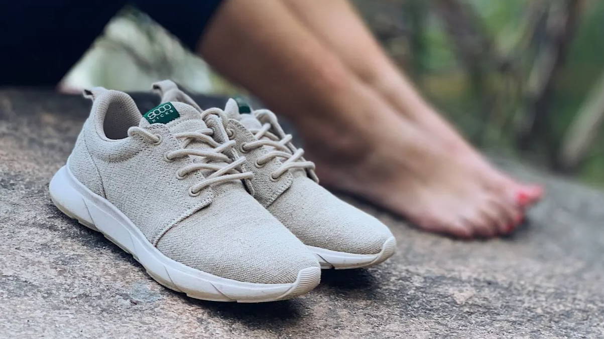Waterproof vegan shoes on a rock.
