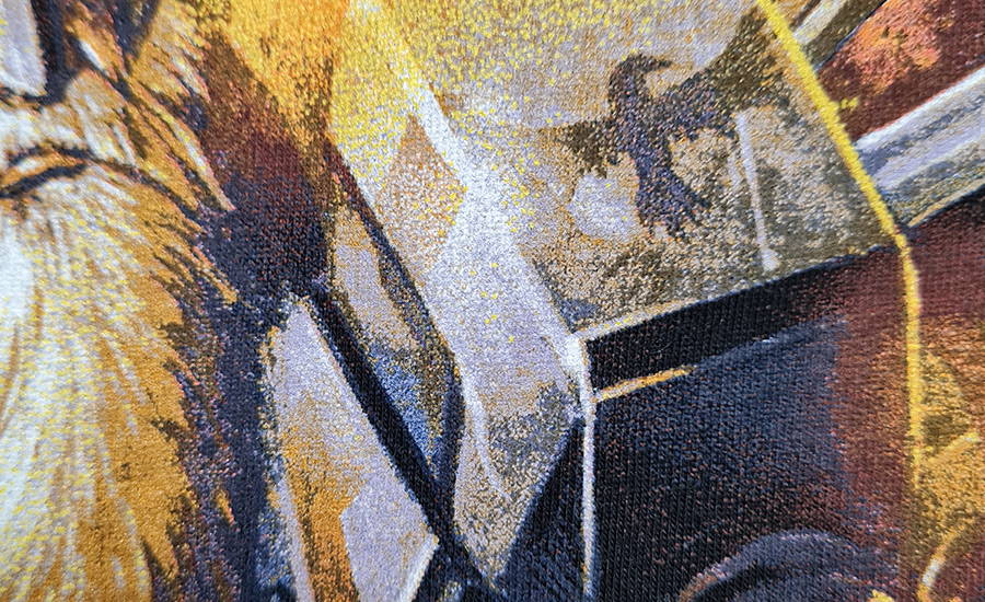 Close up detail of 9 colour Index screen printed design of a fantasy style knight by the artist 'All Things Rotten' showing the technique of high / low tones achieved by printing on and off base. The knight's armour is predominantly dark blue and grey with white and yellow highlights, and shadowed areas of armour feature the dark blue pantone 534C printed off base creating the visual effect of an additional colour and increasing the effect of image graduation and depth.