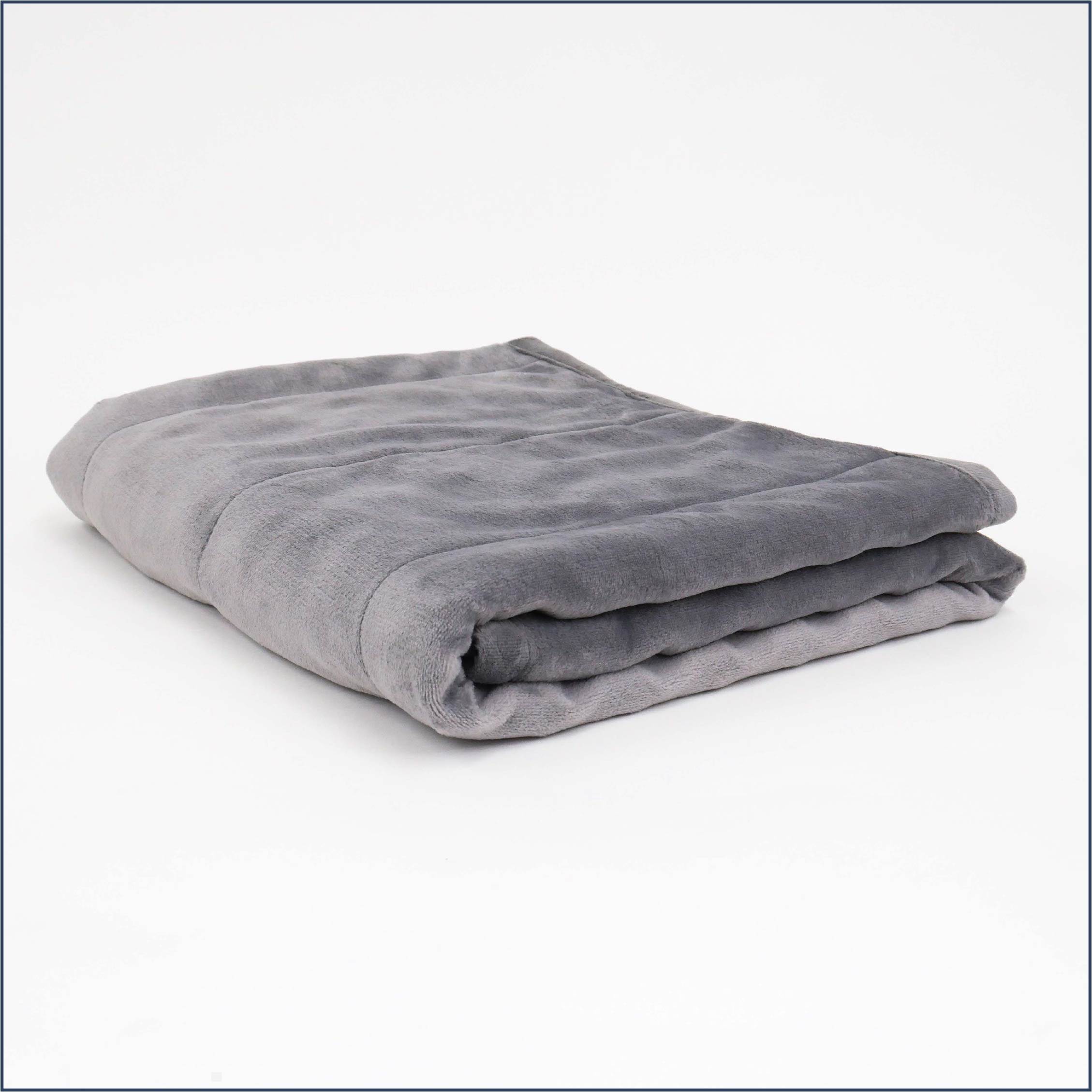 Tuc Kids Warm Weighted Blanket folded on white background.