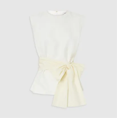 White top with a yellow tie detail at the waist.