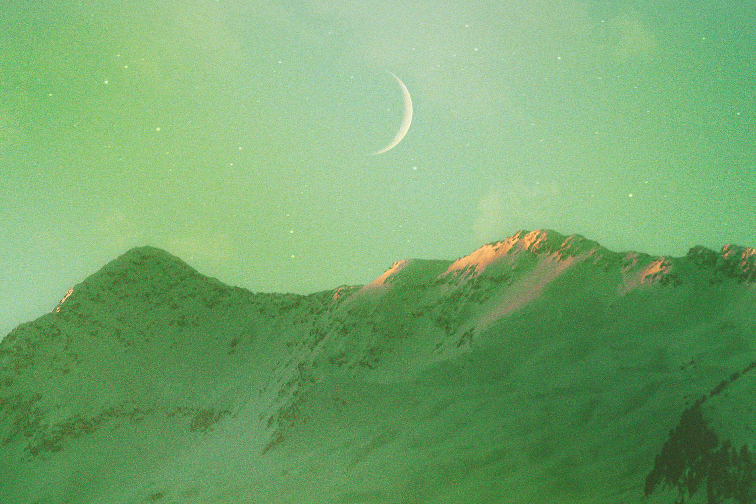 image of crescent moon on top of mountain ridge - sustainable organic loose leaf tea
