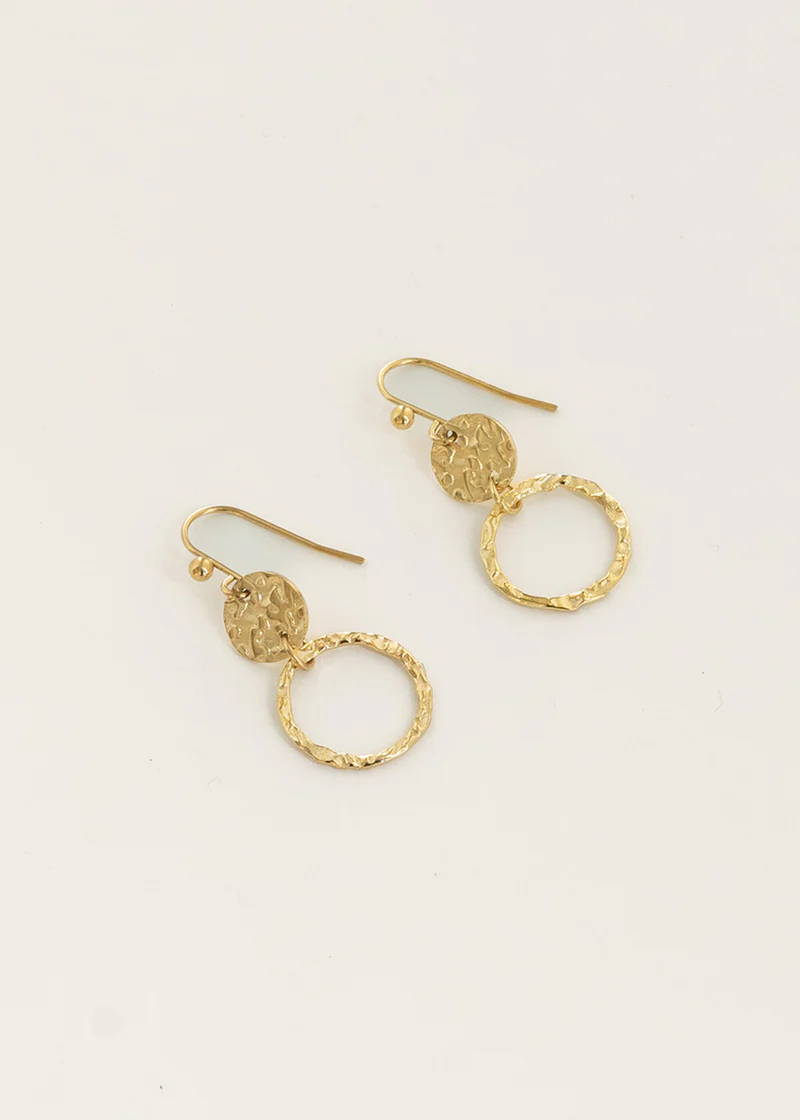 A pair of gold earrings featuring two hammered gold disks