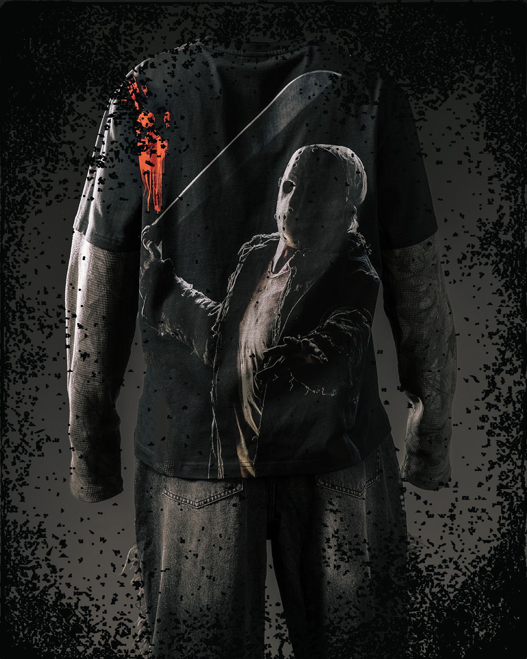 A black t-shirt featuring a graphic of a character with a weapon.