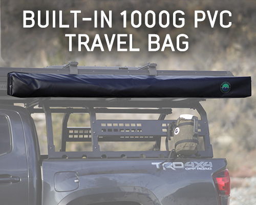 Travel bag on a vehicle's roof rack, labeled 