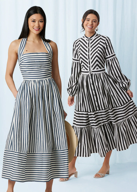 Two women in striped dresses, one in a halter and the other in a long-sleeve.
