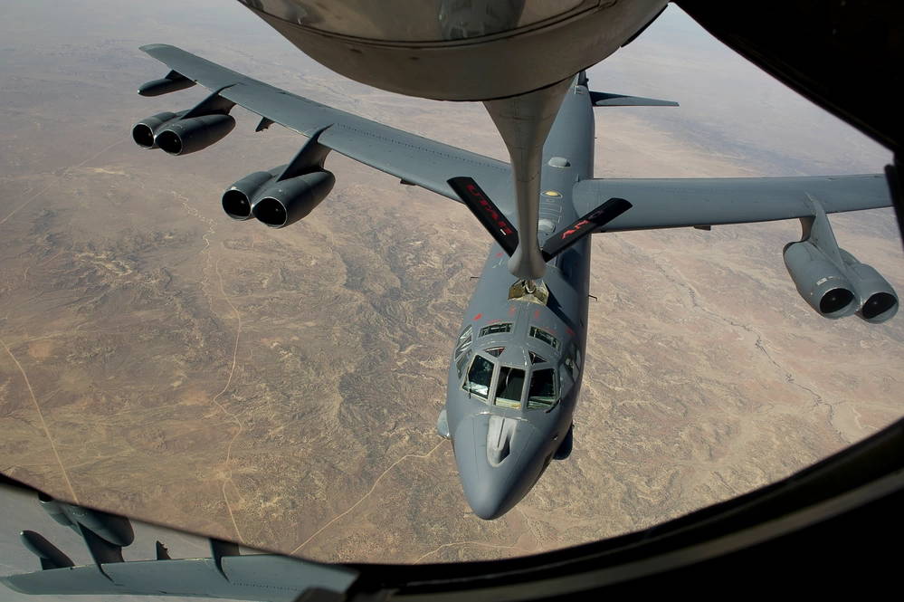 A B-52 Stratofortress, from the 2nd Bomb Wing, Barksdale Air Force Base, La., receives fuel from a Boeing KC-135 Stratotanker, from the 151st Air Fueling Wing, Utah Air National Guard, March 26, 2012. The 151st Air Refueling Wing routinely supports air operations across the western United States.