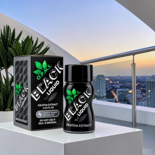 Bottle of herbal extract with packaging on a balcony at sunset.