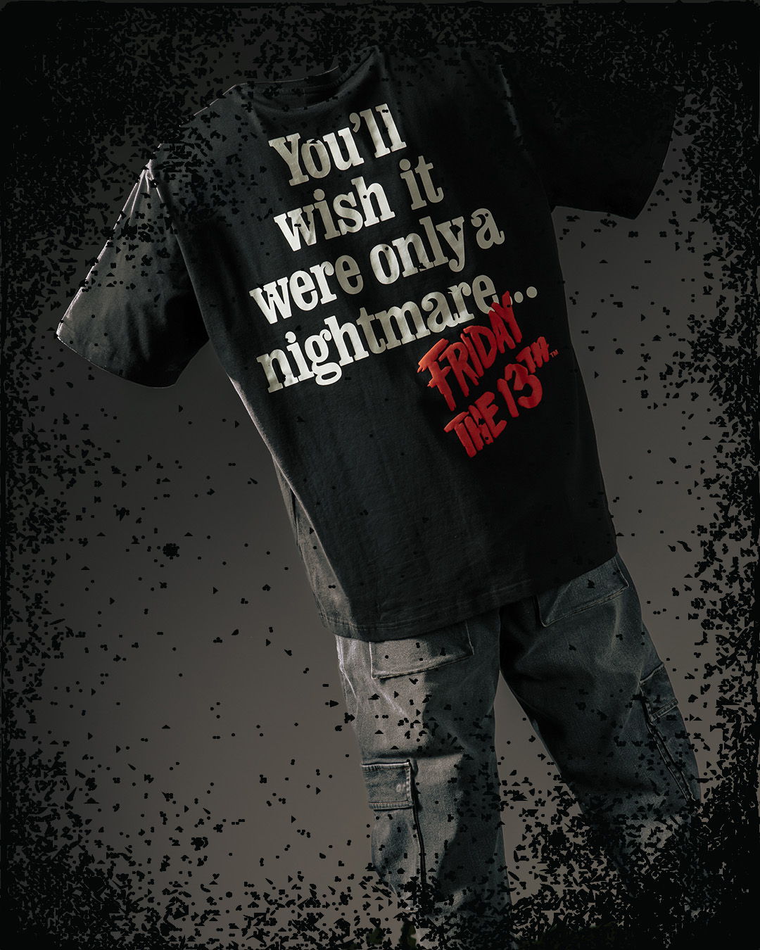 Black t-shirt with text referencing a nightmare and 