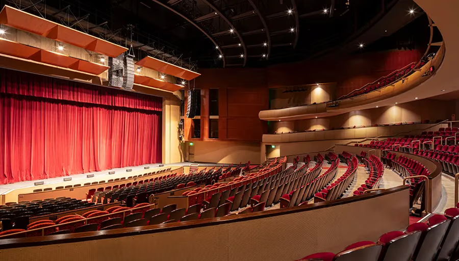 Gallo Center for Performing Arts Stage AV Interior of a theater with red curtains and empty seating.