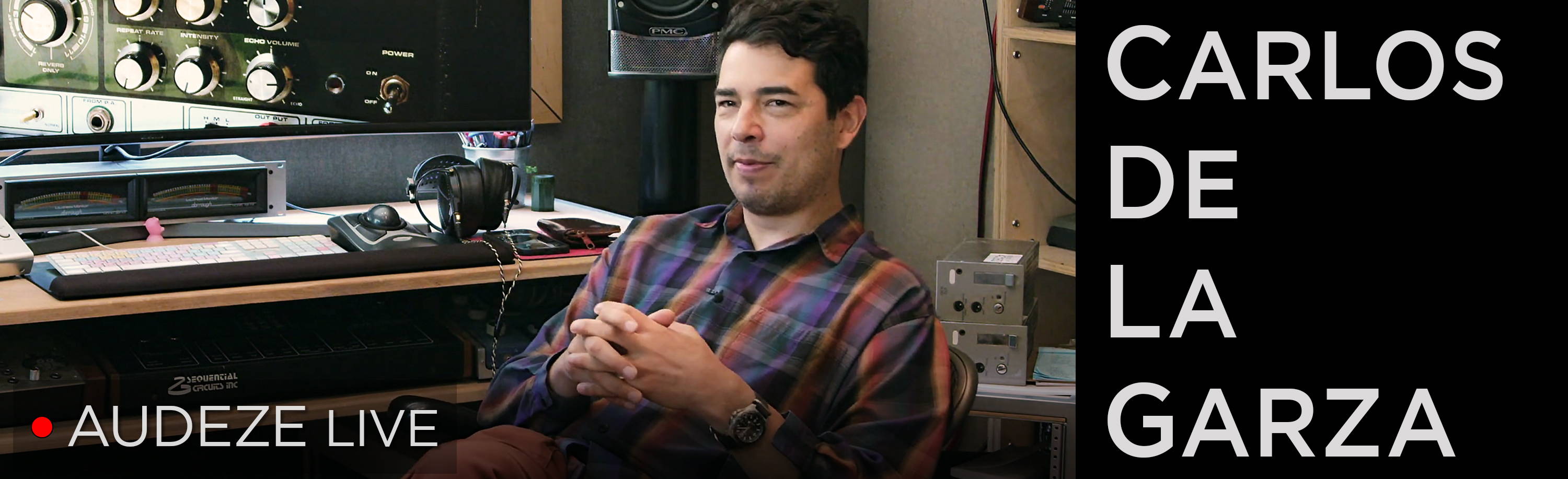 Carlos De La Garza at his studio desk