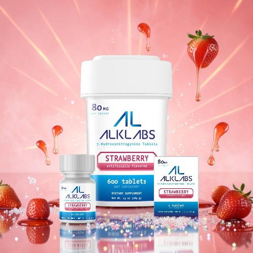 Strawberry-flavored tablets and packaging with strawberries in a vibrant background.